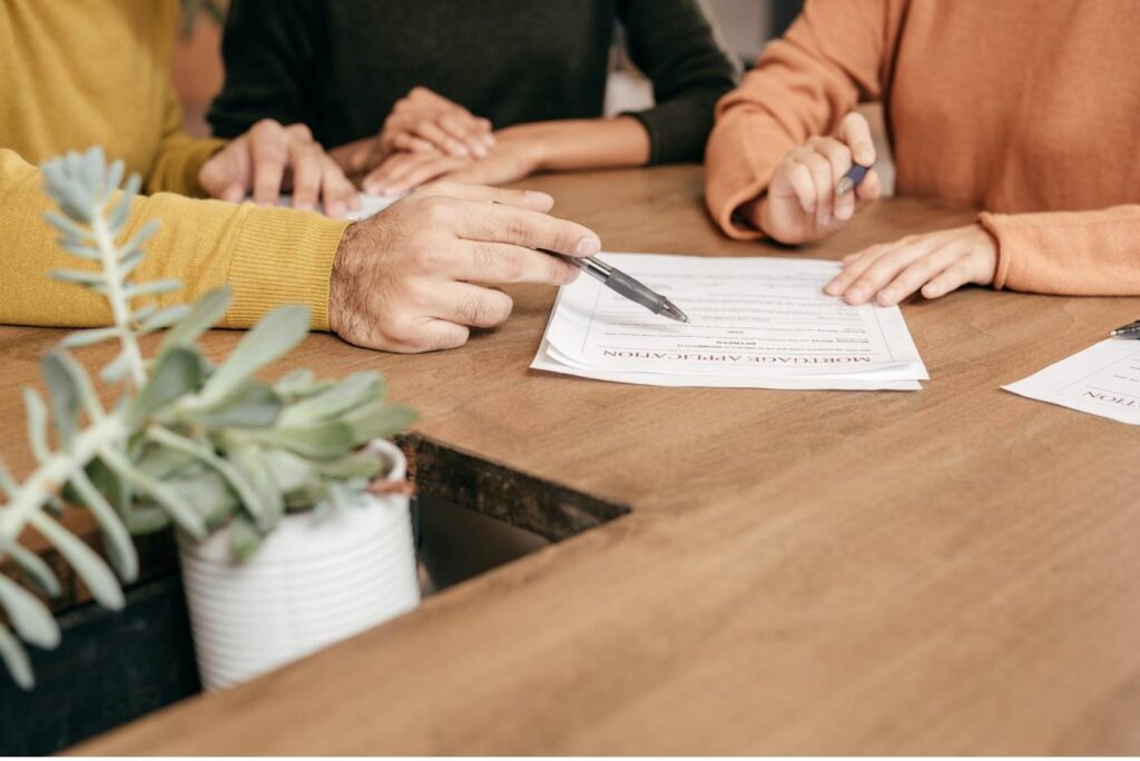 business man signing mortgage