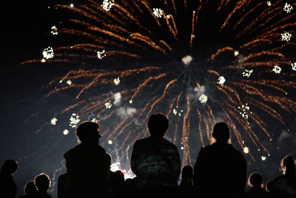 Crowd watching fireworks display