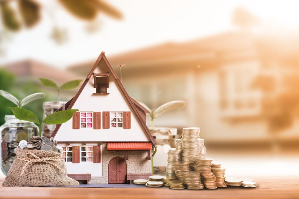 A small house besides a bulk of coins